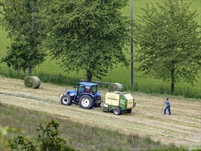 A tractor harvesting hay, Welschensteinach, 20 05 2023