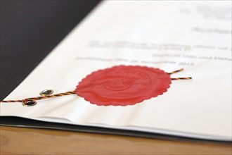 Notarised contract with red official seal