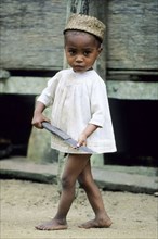 Little boy with knife, Madagascar, Madagascar, Africa