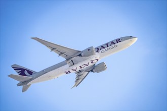 Qatar Cargo Boeing 777F, on take-off at Frankfurt FRA Airport, Fraport, in winter, Hesse, Germany,