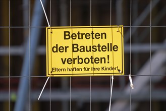 Construction site, signs indicating safety regulations, entering the construction site prohibited,