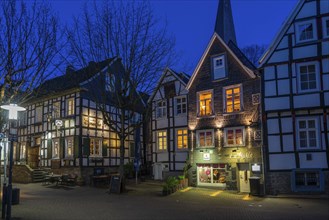 The old town of Hattingen, Emschestraße, St. George's Church, leaning church tower, half-timbered