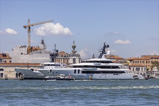 Exclusive private yachts moored on the Canale della Giudecca off Venice, Venice, Italy, Europe