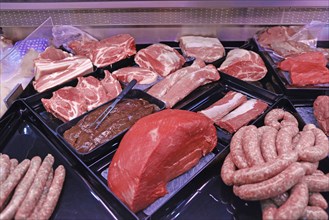 Variety of fine meat products in the butchery (Variety of fine meat products in the butchery)