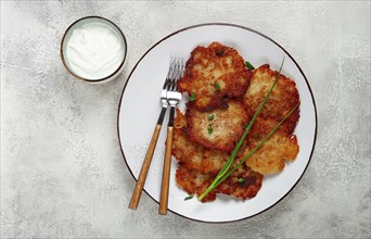 Potato pancakes, pancakes with sour cream, Belarusian dish, homemade, no people