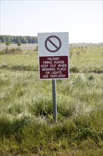 Ministry of Defence warning sign about the danger posed by military firing range on Salisbury