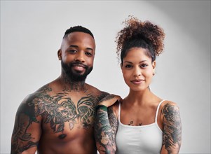 Portrait, tattoo, tattoo, an African-American couple with heavy tattoos on neck and upper body, AI