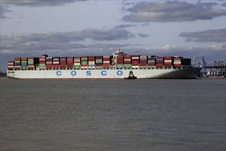 Cosco shipping line container ship arriving at Port of Felixstowe, Suffolk, England, UK