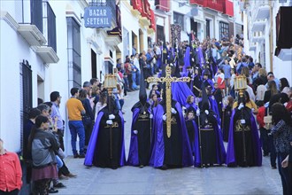 Easter Christian religious procession through streets of Setenil de las Bodegas, Cadiz province,