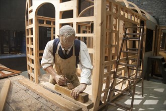 Mannequin of a carpenter in the carriage making section of Steam museum of the Great Western