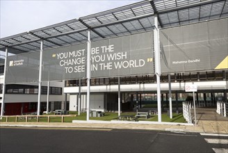 University of Suffolk buildings, Ipswich, England, UK with Mahatma Gandhi quotation about change in