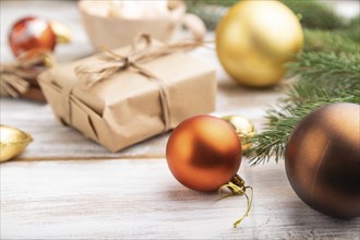 Christmas or New Year composition. Decorations, box, golden balls, cinnamon, fir and spruce