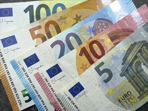 Symbol photo Cash Banknotes euro banknotes lying fanned out on top of each other, Germany, Europe