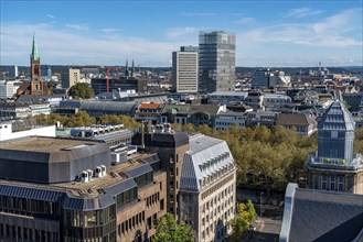 City centre of Düsseldorf, the Johanneskirche, on the right Sparkassen building Steinstraße, below