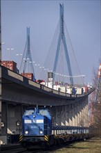 The Köhlbrand Bridge in the port of Hamburg, at the back of the goods train line, spans the 325 m