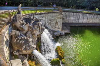 Fountain sculptures at the water basins in the garden of the royal palace Palazzo Reale, Italian