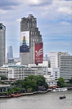 Sathorn Unique Tower with iphone advert, Bangkok, Thailand, Asia