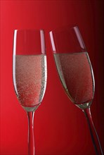 Two glasses filled with champagne, champagne glass, champagne glasses, champagne glass, party,