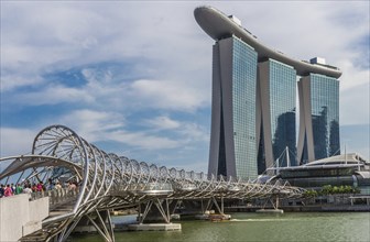 Hotel and casino Marina Bay and helix bridge in Singapore