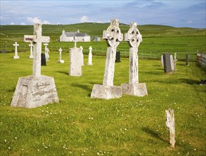 Gravestones in burial ground on Vatersay Island, Barra, Outer Hebrides, Scotland, UK, two