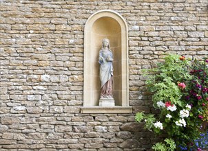 Statue detail in Italianate garden of landscape gardener Harold Ainsworth Peto created between 1899