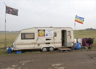 Caravan campaign banner Peace flag for 'Free Stonehenge, access campaign, Stonehenge, Wiltshire,