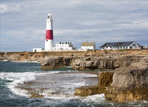 Red and white lighthouse on the coast at Portland Bill, Isle of Portland, Dorset, England, United