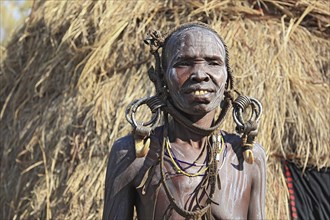 South Ethiopia, in the Maco National Park, Mursi tribe, older Mursi woman with naked upper body and