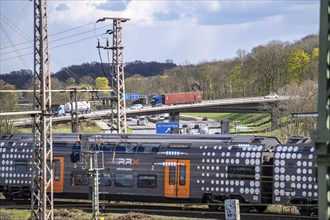 Regional Express, Rhine-Ruhr Express, RRX train on the railway line at the Kaiserberg motorway