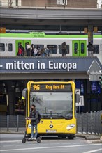 Local transport, junction at the main railway station, local trains, city bus, in the city centre