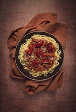 Spaghetti bolognese, with dried tomatoes, homemade, close-up