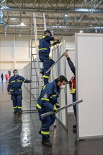 Construction of a vaccination centre for corona vaccinations, in a hall at Messe Essen, by the