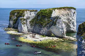 People on kayaks and paddleboards, White Cliffs. Old Harry Rocks Jurassic Coast, Dorset Coast,