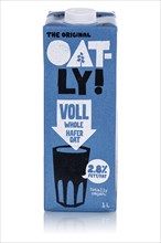 Oatly variety whole oat vegan oat milk released against a white background