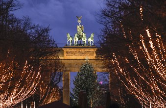 The street Unter den Linden at the Brandenburg Gate is decorated for Christmas, Berlin, 20 December