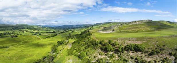 Panorama of Farms and Mountains over Bainbridge Villagefrom a drone, Leyburn, North Yorkshire,