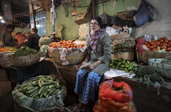 Vendor selling vegetables at a market, ahead of the presentation of the Interim Budget 2024 by