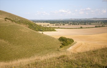 Steep chalk scarp slope and the Vale of Pewsey looking east from near Alton Barnes, Wiltshire,