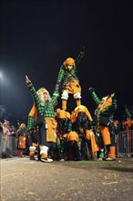 Acrobatic performance in group costumes at a night carnival parade, carnival, Schellbronn night