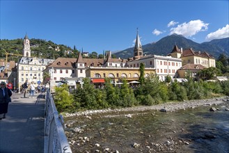 City view, skyline of Merano, river Passer, post bridge, South Tyrol, Italy, Europe