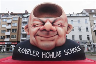 Chancellor Olaf Scholz as an airhead, papier-mâché figure, satirical themed float by Jacques Tilly,