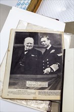 Various posters and prints photo of Winston Churchill and King George 6th, 1940s wartime picture