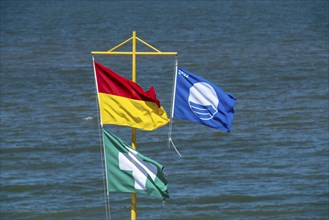 Beach of the village, Domburg in Zeeland, seaside resort, coast, flags on the beach, good water