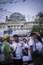 Scenes in the fan zone on Platz der Republik in front of the Reichstag building taken in Berlin, 29