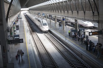 Trains at platform inside Santa Justa railway station Seville, Spain, Europe