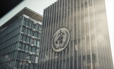 View of the logo of the World Health Organisation (WHO) on a building at its headquarters in Geneva