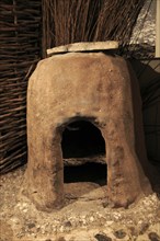 Bread oven in Iron Age museum, Andover, Hampshire, England, UK