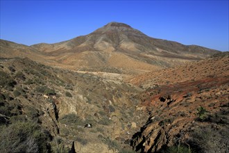 Bare moon-like arid landscape in mountains between Pajara and La Pared, Fuerteventura, Canary