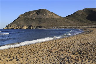 Beach and waves at Playa de Playazo, Rodalquilar, Cabo de Gata natural park, Almeria, Spain, Europe