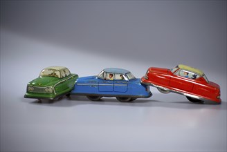 Road traffic, automobile, rear-end collision, depicted with model cars made of sheet metal